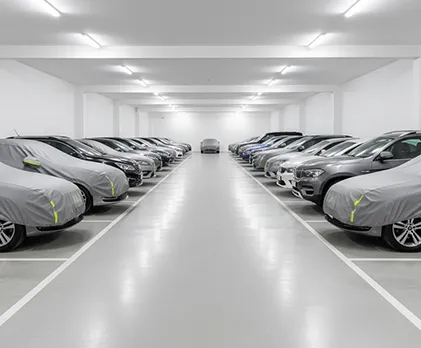 Indoor secure parking for cars and SUVs in a clean, well-organized storage facility